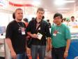O coordenador do Gubro-Pr - Grupo de Usuários BrOffice Paraná, Vitório Furusho e participantes, na estande no Latinoware 2007