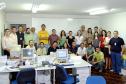 O diretor-presidente Nizan Pereira ao lado da equipe de 
técnicos desenvolvedores de sistemas da Celepar. Foto: 
Celepar