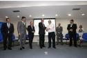 O secretário para Assuntos Estratégicos, Edson Casagrande e o presidente da Celepar, Jacson Carvalho Leite, assinam protocolo de intenções, para instalação da Rede 399 de internet para todos.Curitiba, 26-03-14.Foto: Arnaldo Alves / ANPr.