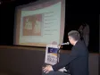 Apresentação do secretário de Obras Públicas, Júlio César de Araújo Filho, destacando os investimentos em cada região do Estado, em construção de obras em parceria com as diversas secretarias e órgãos da administração direta e indireta (na tela a CELEPAR)