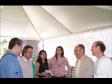Os secretários da Agricultura, Valter Bianchini, o de Relações com a Comunidade, Milton Buabssi e demais participantes visitam a feira de serviços "Paraná em Ação"