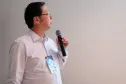 O analista da Celepar, Nelson Aoki Umeda, em meio à apresentação da palestra "Inovação tecnológica como fator de sucesso nos programas de regularização de débitos da Secretaria da Fazenda do Paraná