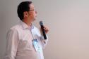 O analista da Celepar, Nelson Aoki Umeda, em meio à apresentação da palestra "Inovação tecnológica como fator de sucesso nos programas de regularização de débitos da Secretaria da Fazenda do Paraná