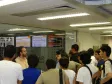 O Diretor de Operações, Robson Valentin e os estudantes e professores da carreira de Engenharia em Sistemas de Informação da Universidade Tecnológica Nacional - Regional Tucumãn/Argentina, na sala de Controle da CELEPAR 