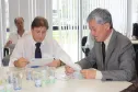 O presidente Jacson Carvalho Leite e o secretário Cassio Taniguchi analisam processos em trâmite no Cosit 