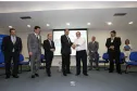 O secretário para Assuntos Estratégicos, Edson Casagrande e o presidente da Celepar, Jacson Carvalho Leite, assinam protocolo de intenções, para instalação da Rede 399 de internet para todos.Curitiba, 26-03-14.Foto: Arnaldo Alves / ANPr.