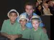 Na foto Luiz Felipe Vieira Marques (pandeiro), Lucas Willian Silva (cavaquinho) e Atílio Mauricio Rodrigues Puka (flauta) , todos com 10 anos de idade e o professor da rede estadual de educação e da Casa de Música de Paranaguá, Rafael Palotino