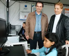Abertura do Paraná em Ação quinta edição de 2011 em Curitiba. Secretário de Relações com a Comunidade Wilson Quinteiro e o presidente Jacson Carvalho Leite no estande da Celepar